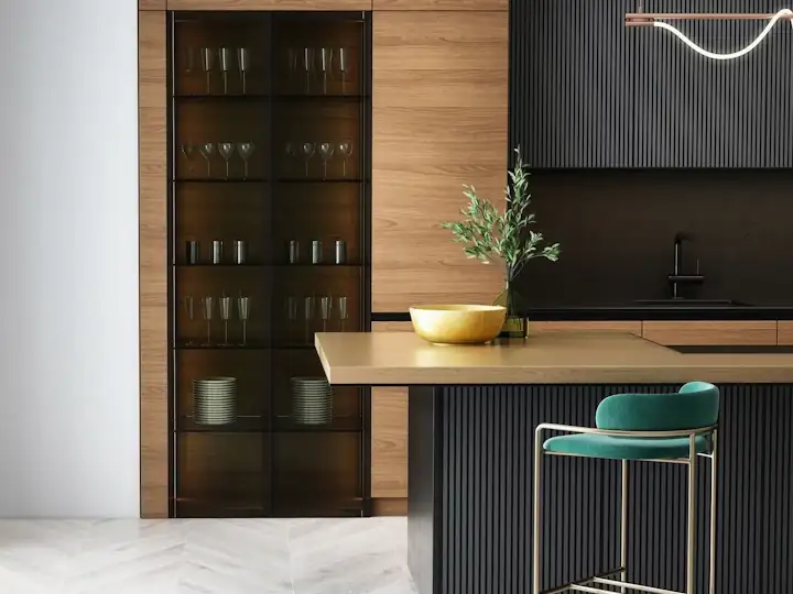Modern kitchen with wood cabinetry and dark accents